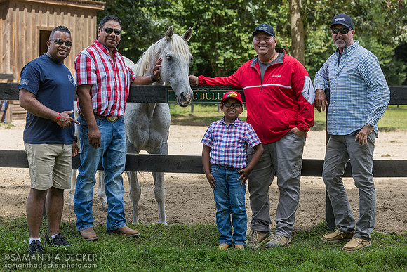Members of the NYRA gate crew pose with Be Bullish, 2025