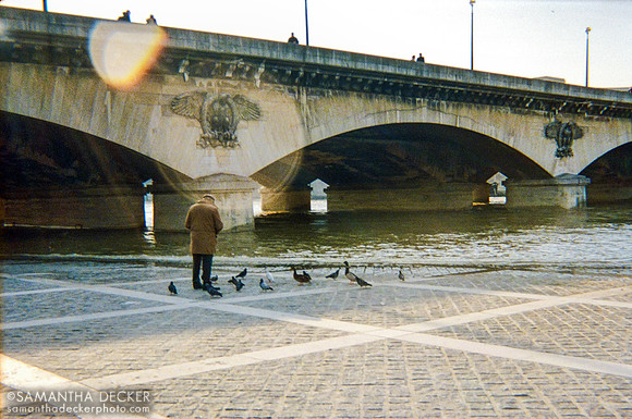 Man Feeding Birds, Paris, 2006