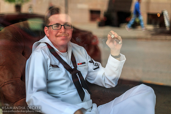Naval Sailor Enjoys a Cigar at James & Sons Tobacconists in Saratoga Springs