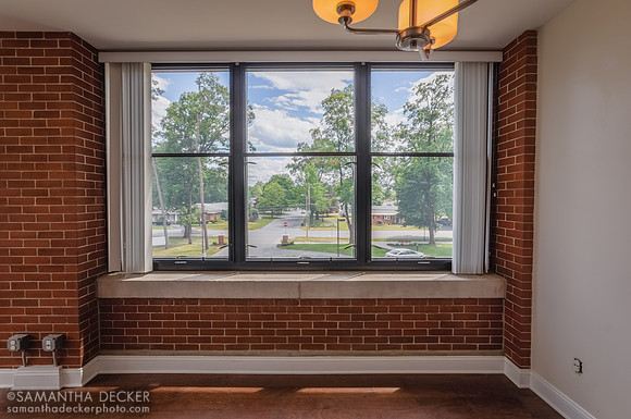 Living room looking out onto Lake Ave and MacArthur Dr