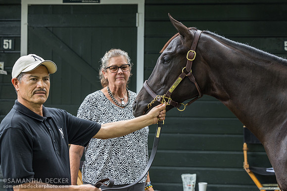 Kim Nardelli and groom with a Not This Time colt o/o Kayce Ace