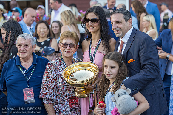 Repole family pose with the trophy
