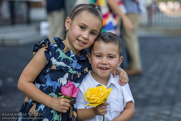 Flavien Prat's kids Elena and Lenny hold flowers from the Diana blanket